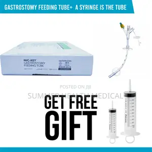 Gastrostomy Feeding Tube + a Syringe in the Tube