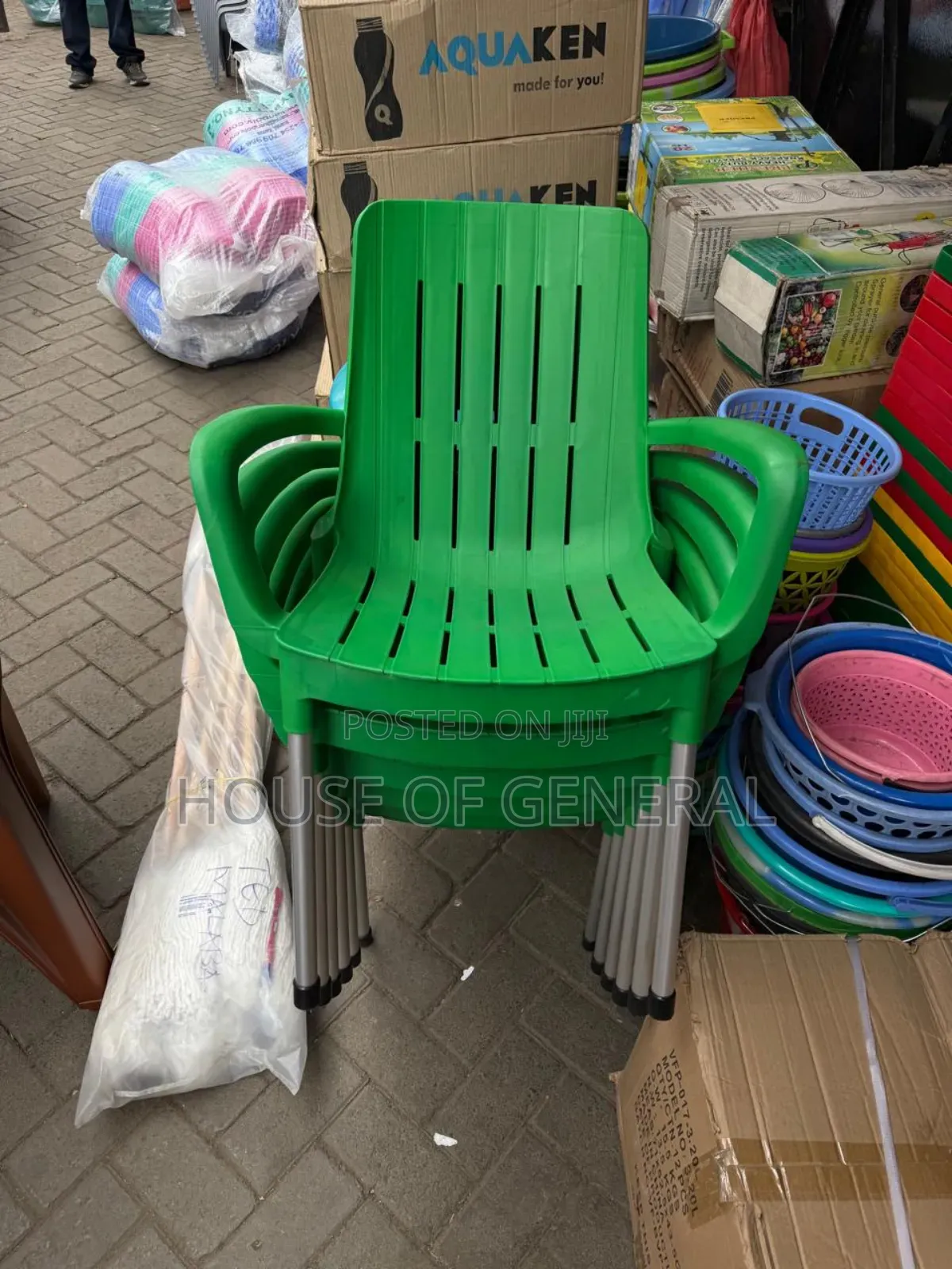 Green Plastic Chair With Metal Legs. Strong and Durable Chair