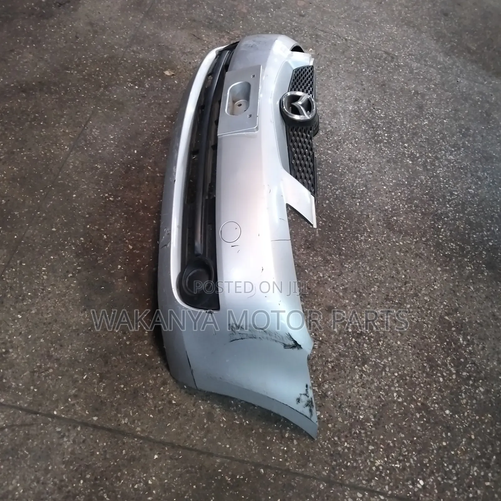 Mazda Demio Model 2005/2006 Front Bumper Complete With Grille