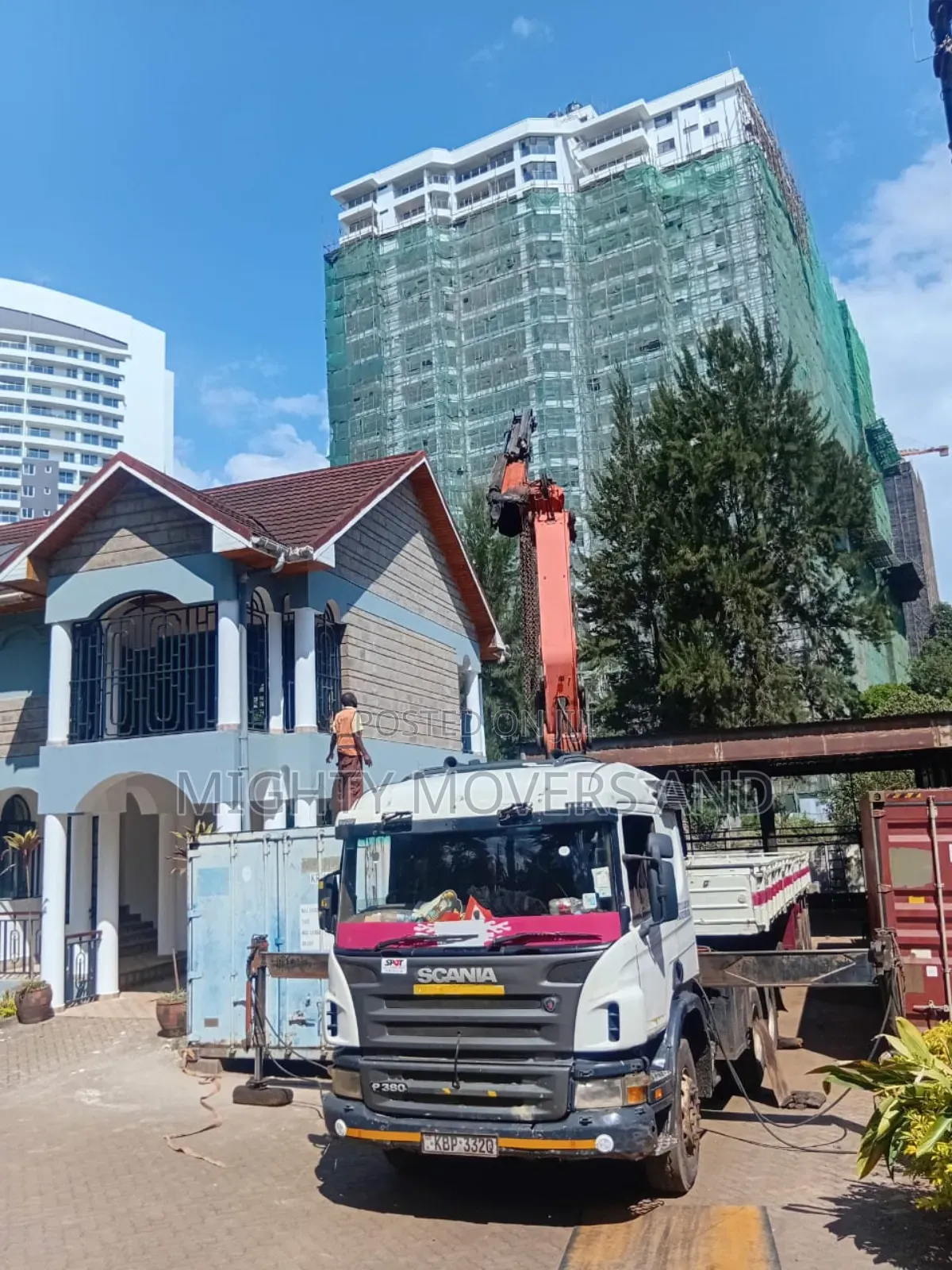 Trailers With Cranes Are Available for Lifting and Logistics Services