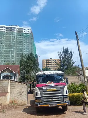 Trailers With Cranes Are Available for Lifting and Logistics Services