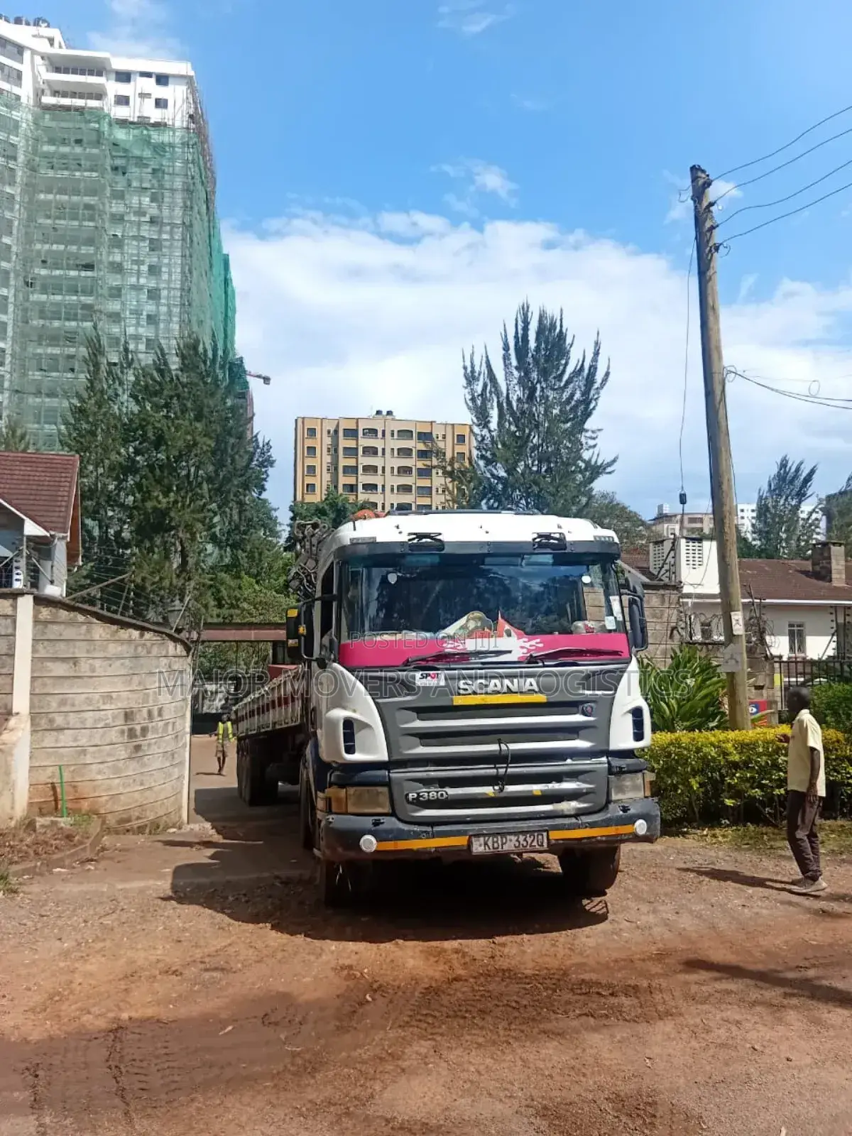 Trailer With Crane Ready for Delivery of Goods