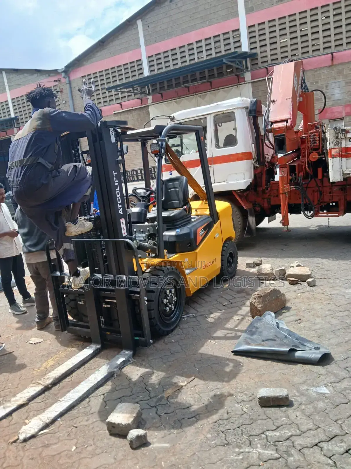 Trailer With Crane Ready for Delivery of Goods