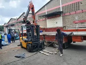 Flatbed Trailer With Crane Are Ready for Transportation