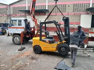 Flatbed Trailer With Crane Are at Hand for Transportation