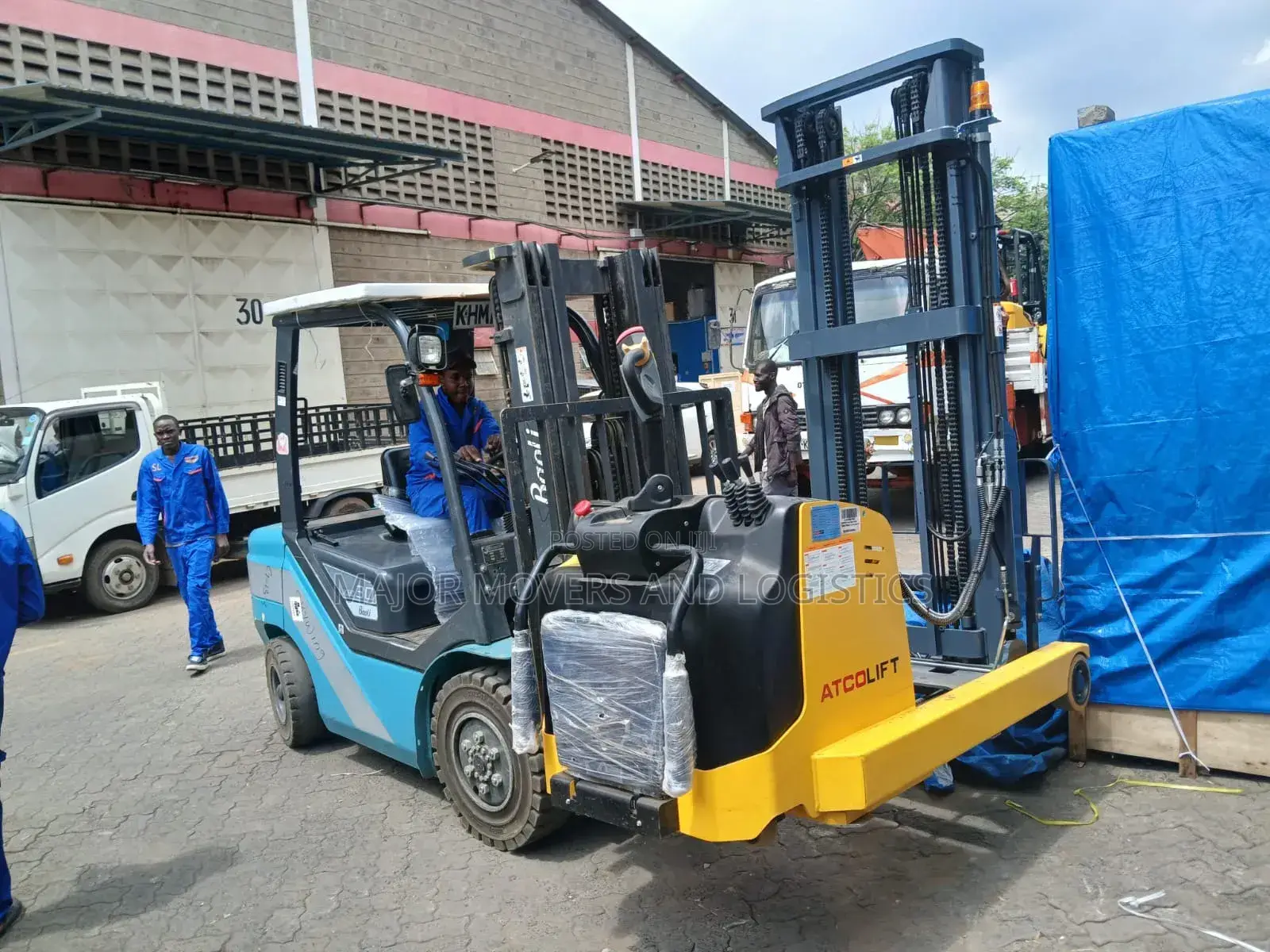 Flatbed Trailer With Crane Are Ready for Hoisting and Transportation