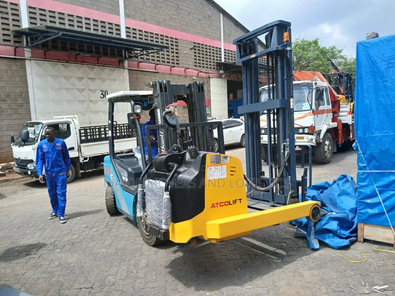 Flatbed Trailer With Crane Are Ready for Hoisting and Transportation
