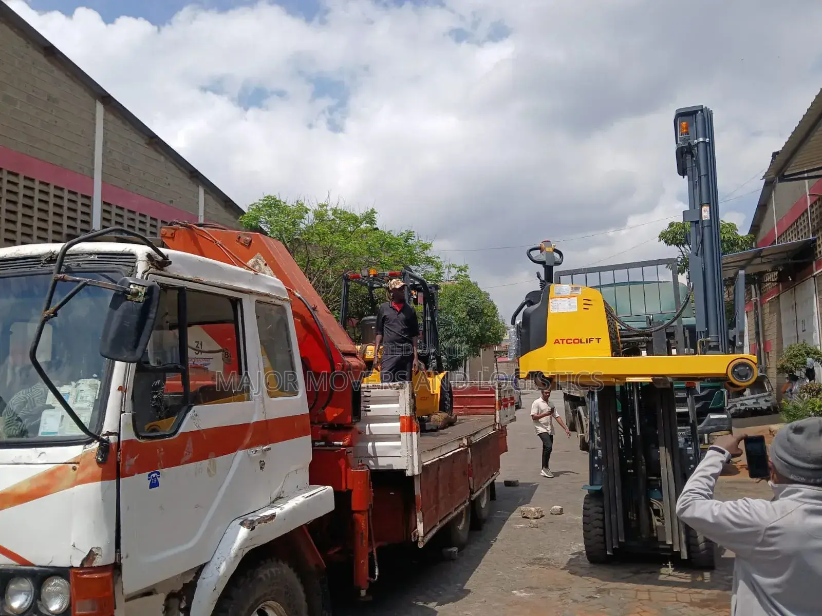 Flatbed Trailer With Crane Are Ready for Cross Country Delivery