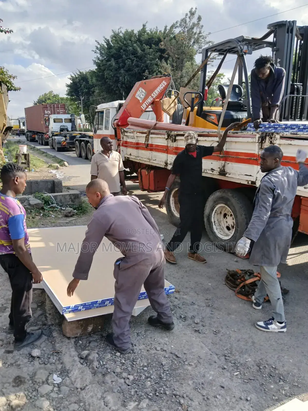 Flatbed Trailer With Crane Are Ready for Cross Country Delivery