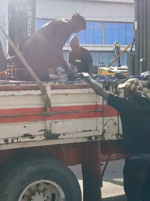 Flatbed Trailer With Crane Are Ready for Cross Country Delivery