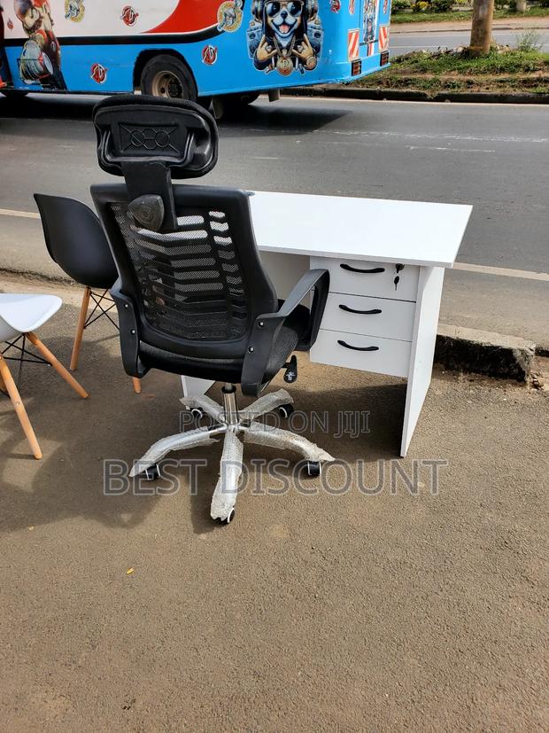 White Table and Headrest Office Chairs - main view