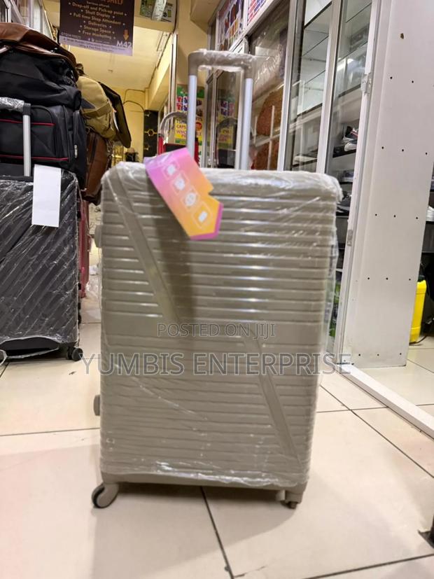 Large Size Rubber Suitcase 25kgs(66cm Height)At 4000 in Color.Brown