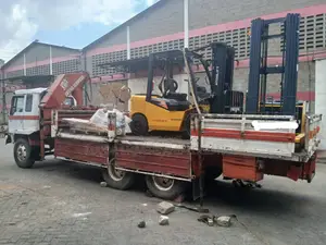 Trailer With Crane Ready for Transportation and Hoisting
