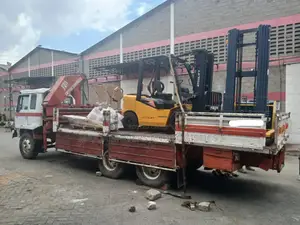 Trailer With Crane Ready for Transportation and Hoisting
