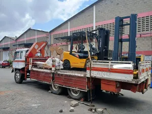 Trailer With Crane Ready for Transportation and Hoisting