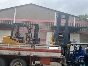 Flatbed Trailer With Crane Are Ready for Across Border Transportation