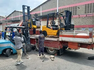 Flatbed Trailer With Crane Are Ready for Across Border Transportation