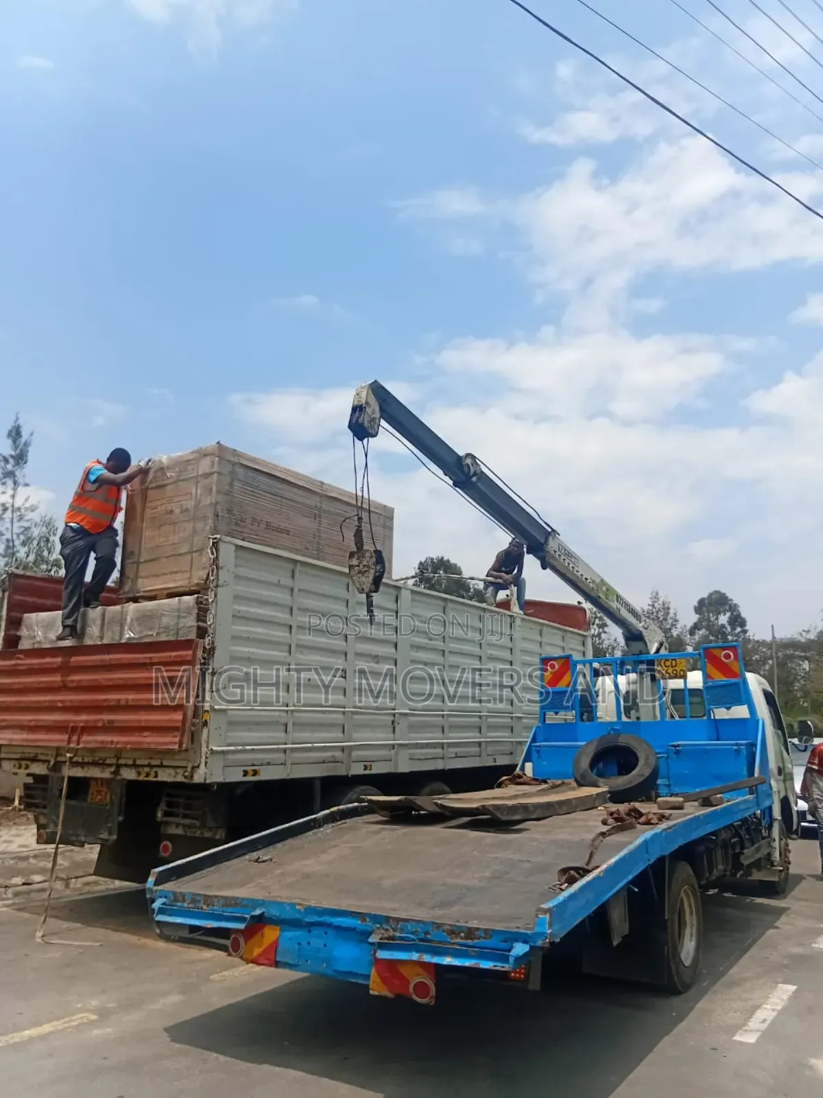 Flatbed Trailer With Crane Are at Hand for Cross Country Delivery
