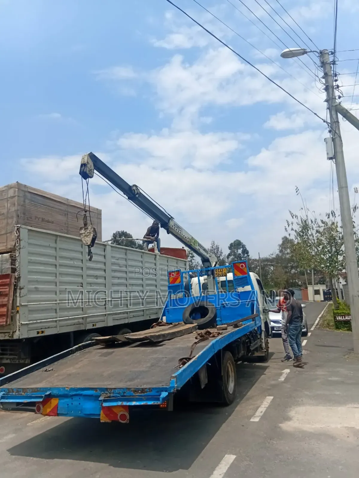 Flatbed Trailer With Crane Are at Hand for Cross Country Delivery