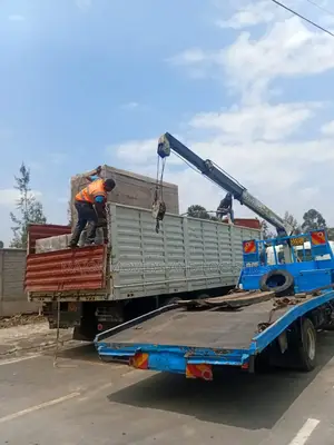 Flatbed Trailer With Crane Are at Hand for Cross Country Delivery