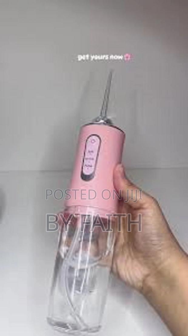 Portable Dental Water Flosser With 4 Nozzles