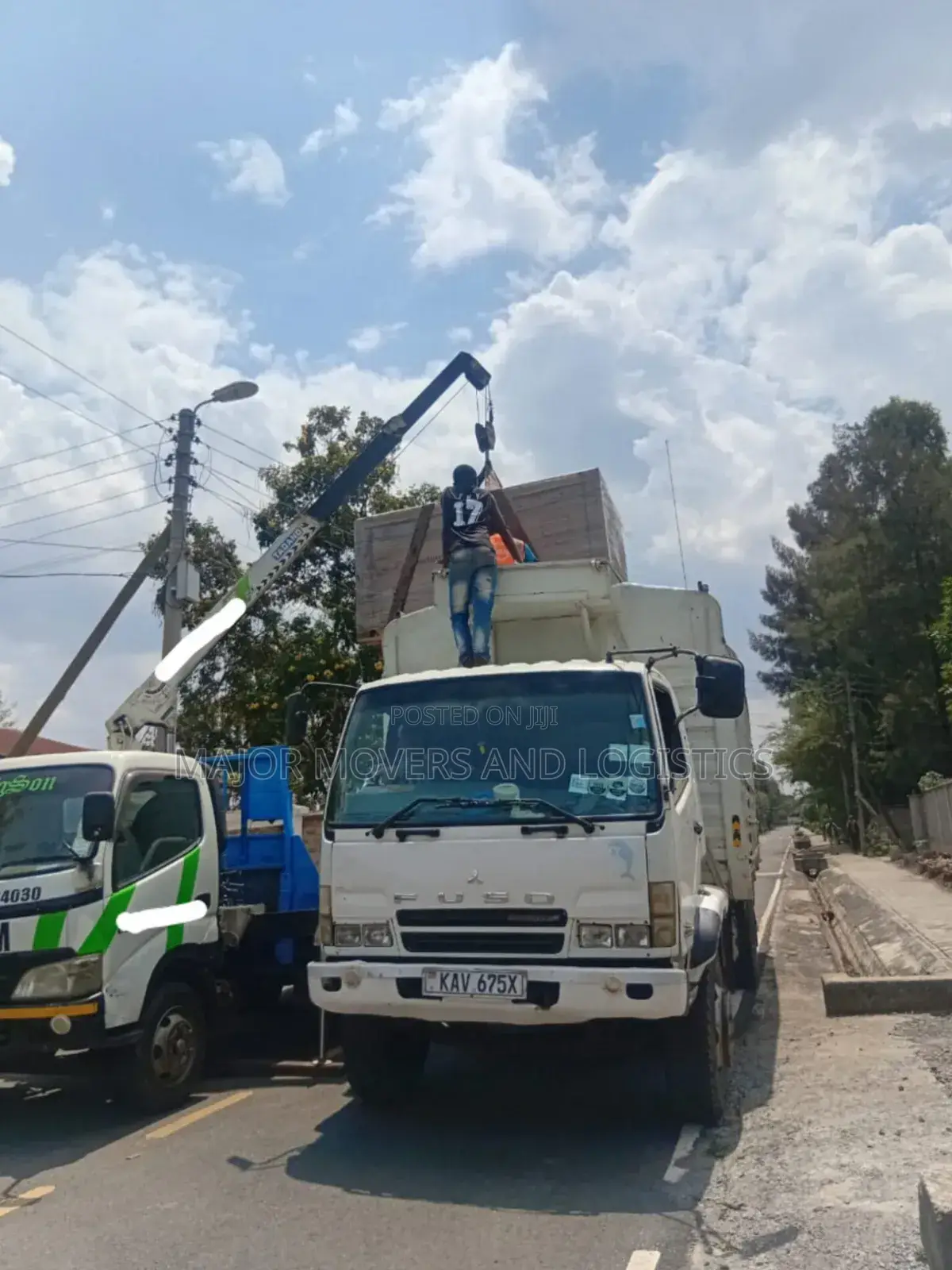 Flatbed Trailer With Crane Are Ready for Inter Country Logistics