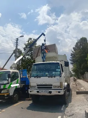 Flatbed Trailer With Crane Are Ready for Inter Country Logistics