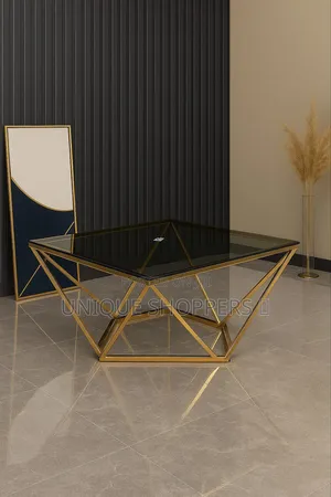 Square Tampered Glass Coffee Table With Golden Diamond Shaped Stainles