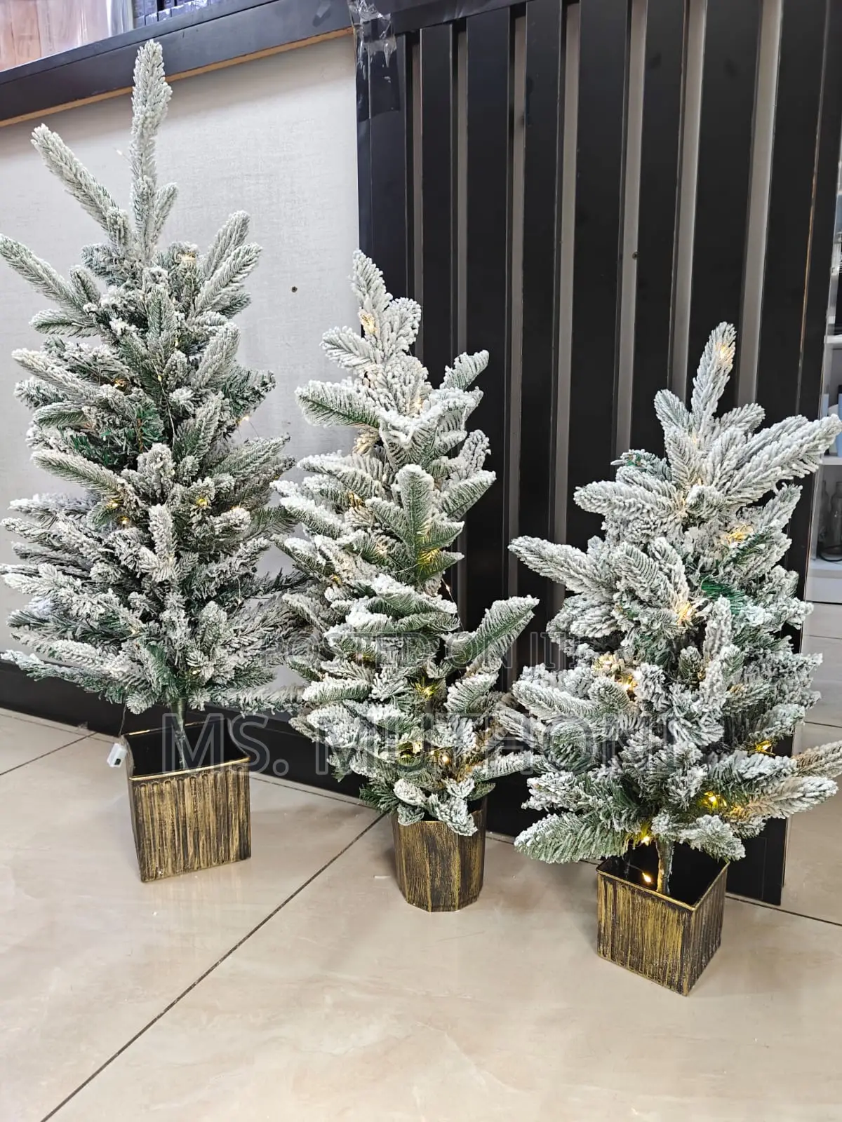 A Set of 3 Pre Lit Mini Christmas Trees*