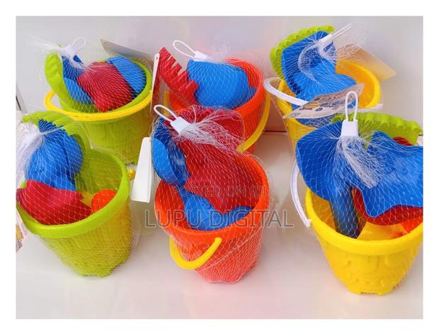 Beach Buckets.
Comes With Beach Toys.
