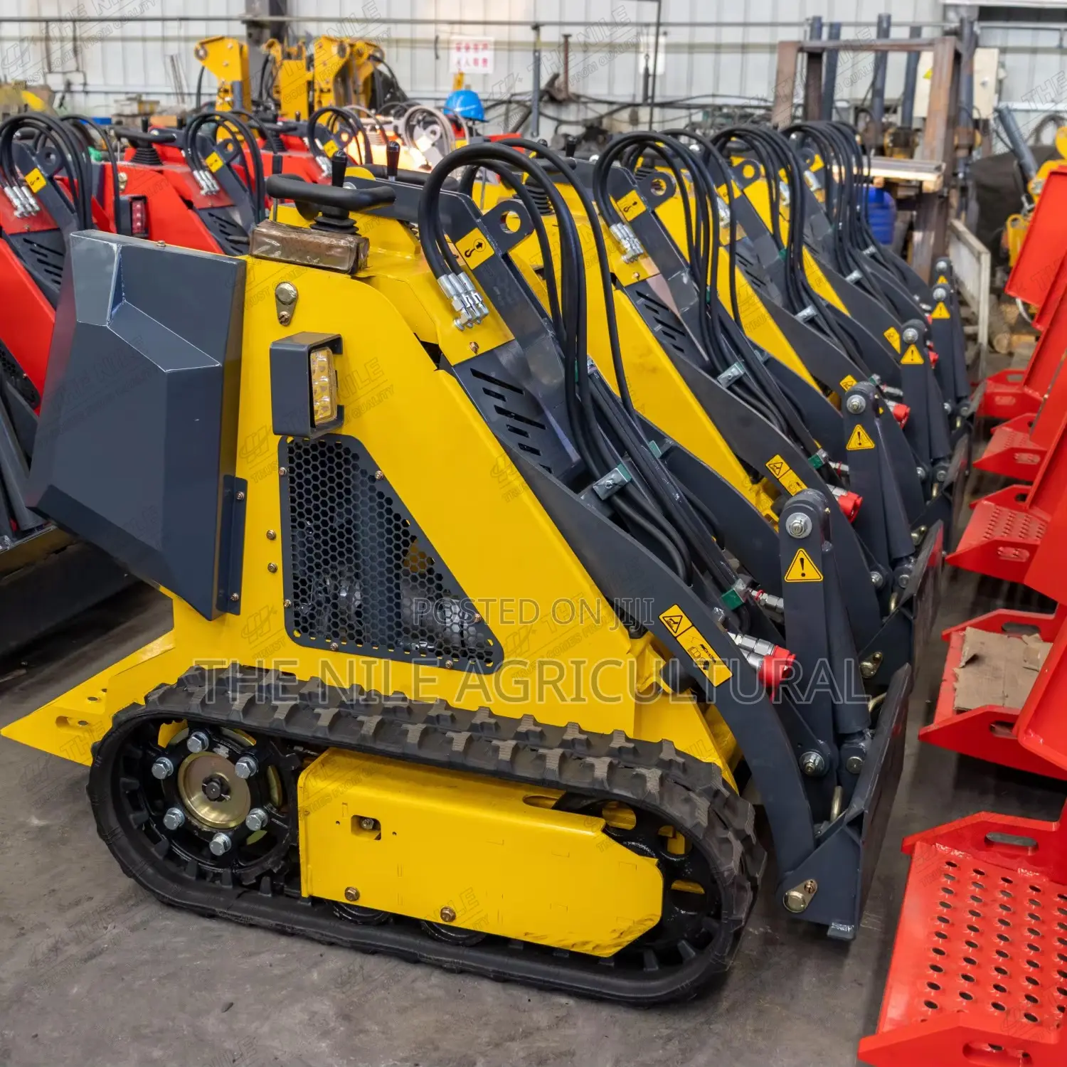 Compact Multi-Purpose Loader, Equipped With Various Attachments
