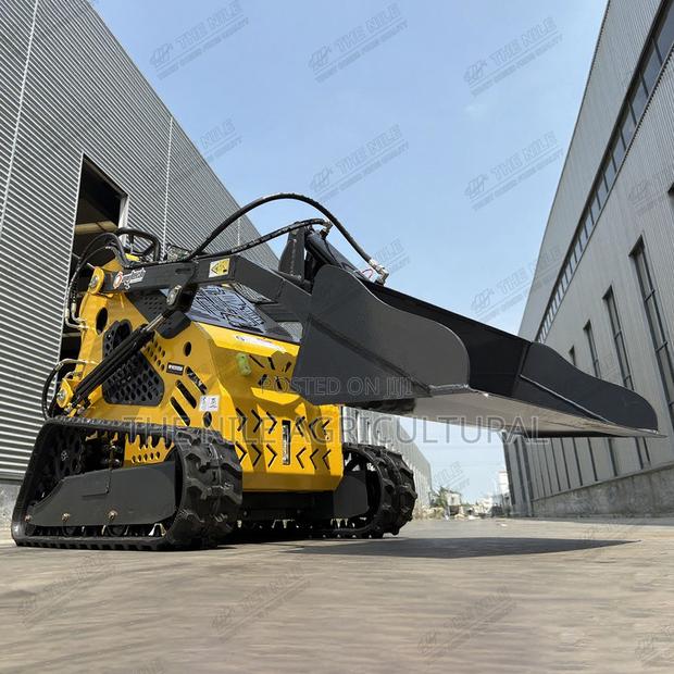 Compact Multi-Purpose Loader, Equipped With Various Attachments - thumbnail 2