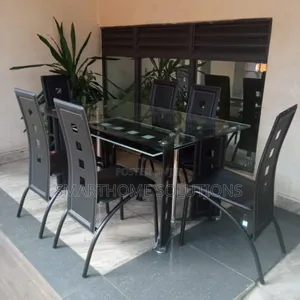Executive 6 Sitter Glass Dinning Table With Leather Seat