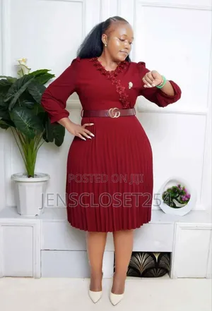 Pleated Official Dress With a Belt and a Broach