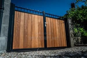 Stylish Modern Metal Swing Gate With Unique Design - main view