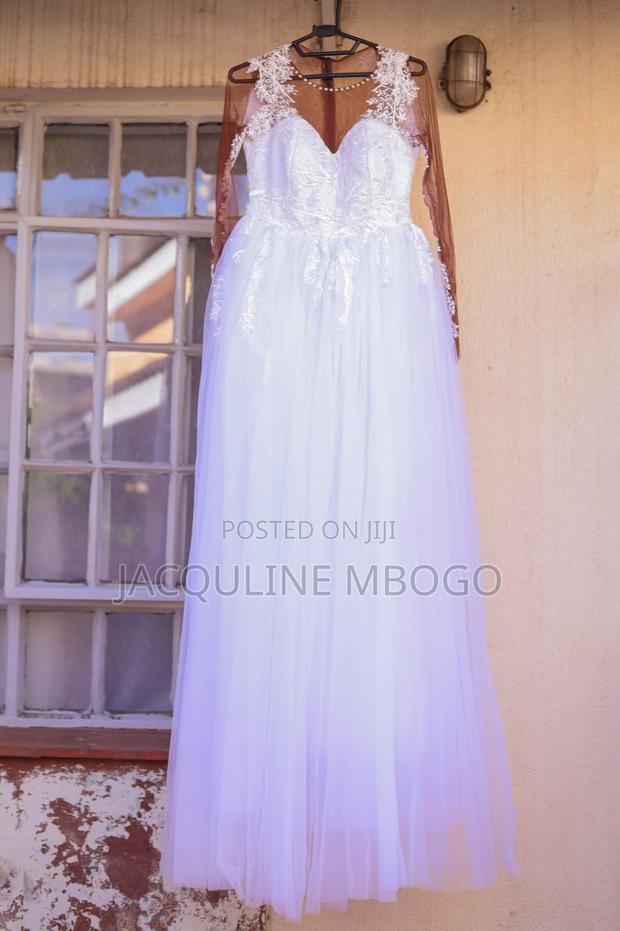 A-Line Wedding Gown - Long Sleeve - Lace Embroidery (Full Lace Bottom)