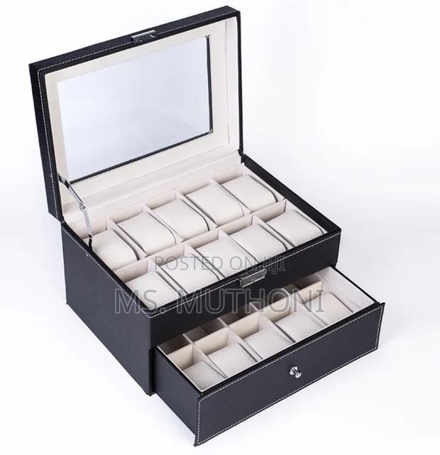 Black Pu Leather 20-Slot Watch Box With a Glass Top a Bottom Drawer.