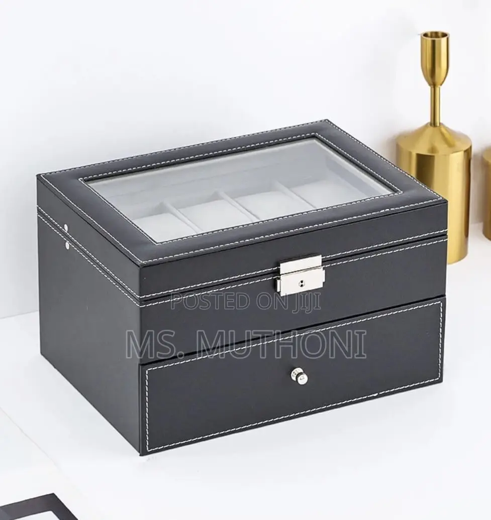 Black Pu Leather 20-Slot Watch Box With a Glass Top a Bottom Drawer.