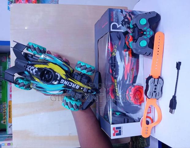 Remote Controlled Gesture Stunt Car With A Rechargeable Battery