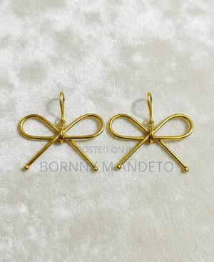 Handcrafted Brass Bow Earrings - thumbnail 2