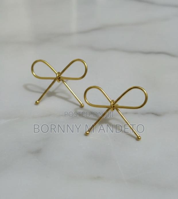 Handcrafted Brass Bow Earrings - thumbnail 3