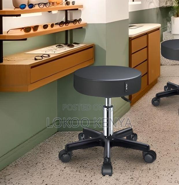 Stool; Adjustable Rolling Leather Round Backless Counter Stool