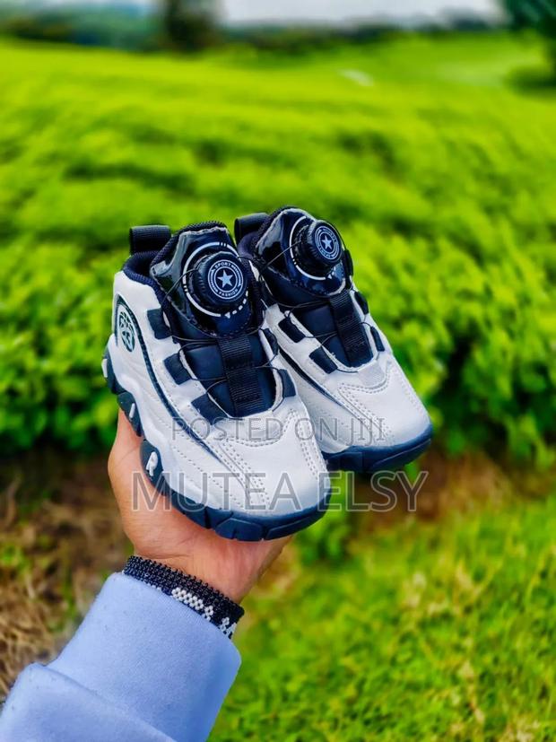 Air Kids 23 White With a Tarch of Blue Black Sneakers