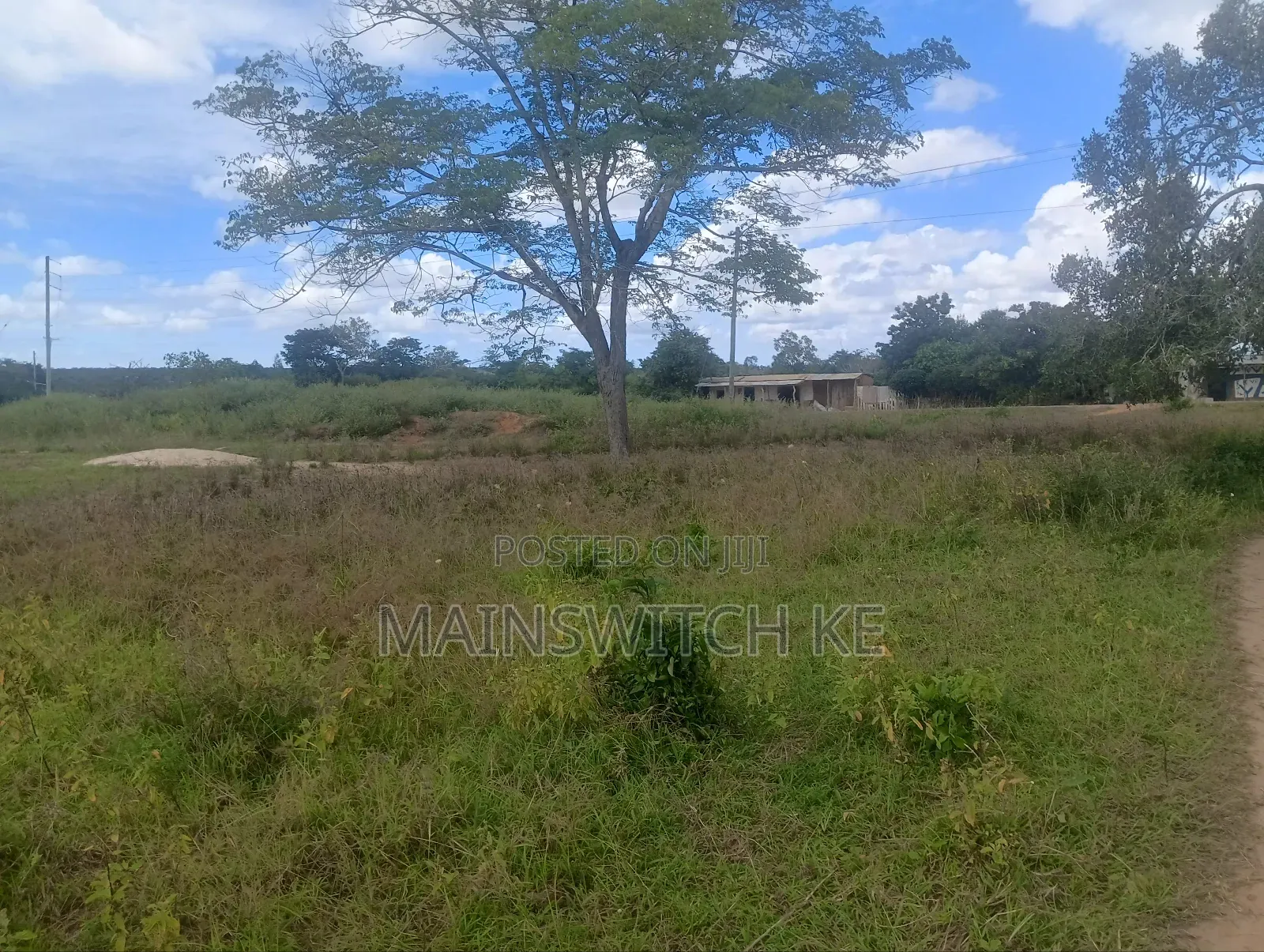 2 Acres Touching Tarmac Road