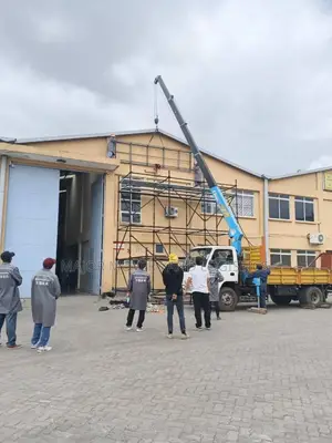 Mguu Kumi Trucks With Hoisting Cranes Are Available