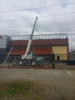Mguu Kumi Trucks With Hoisting Cranes Are Available