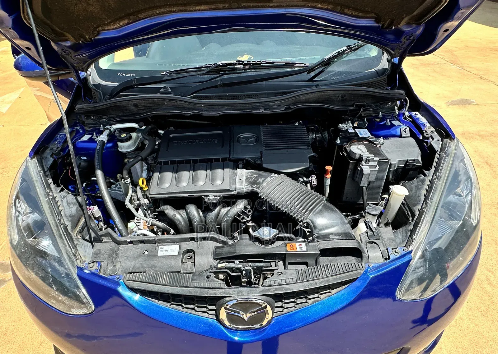 Mazda Demio 2010 Blue