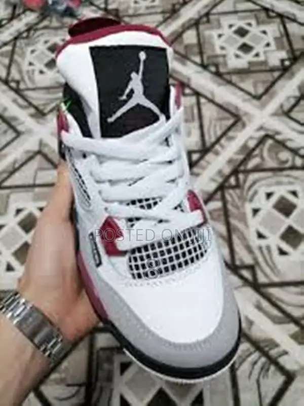 Jordan 4 Bold Color Mix Sneakers – Stylish Finish