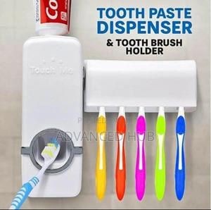 Wall Mounted Toothpaste Dispenser With Toothbrush Holder - thumbnail 2