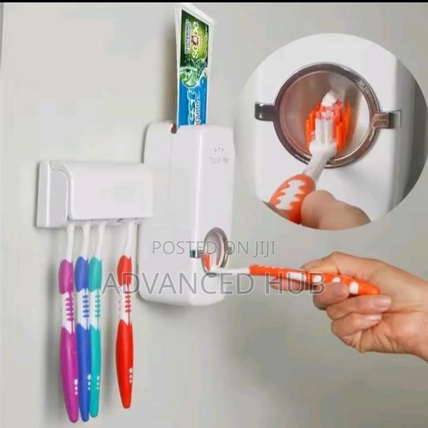 Wall Mounted Toothpaste Dispenser With Toothbrush Holder - thumbnail 4